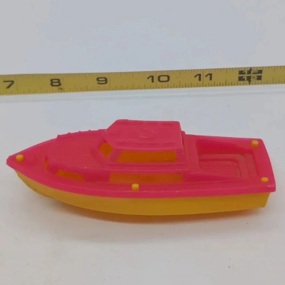 Vintage Red and Yellow Plastic Boat tub toy